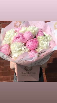 white hydrangea and pink peony
