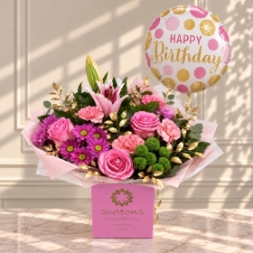 Timeless Beauty with happy birthday balloon