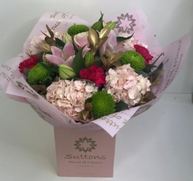 pink and gold hand tied